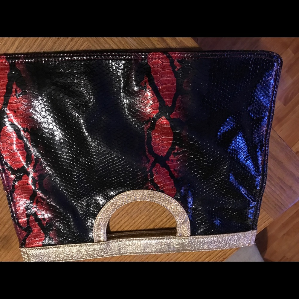 Beautiful multi color snake print handbag clutch
